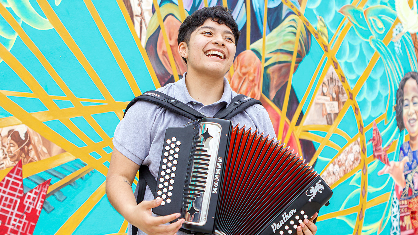 Student playing accordion at SBUSD Ethnic Studies celebration
